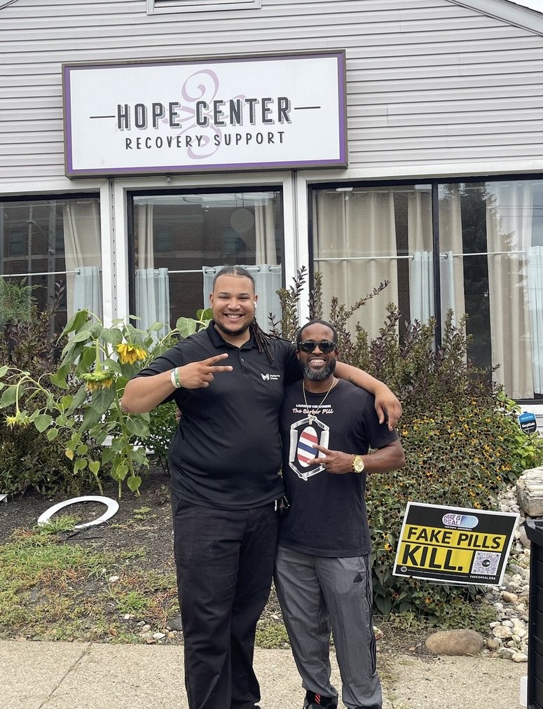 Carter McKinney and Lawrence Wright of The Barber Pill outside Bethlehem Hope Center